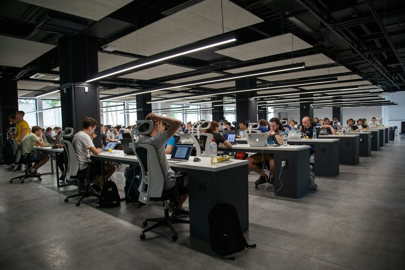 Operations center with teams at monitoring screens